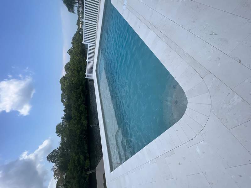 Minimalist pool structure in high water table area